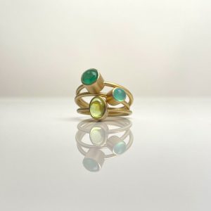 Solo Uno emerald, opal and peridot rings